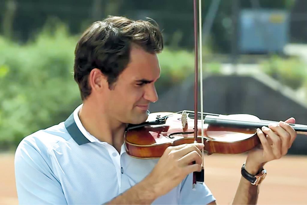 Roger Federer playing a violin