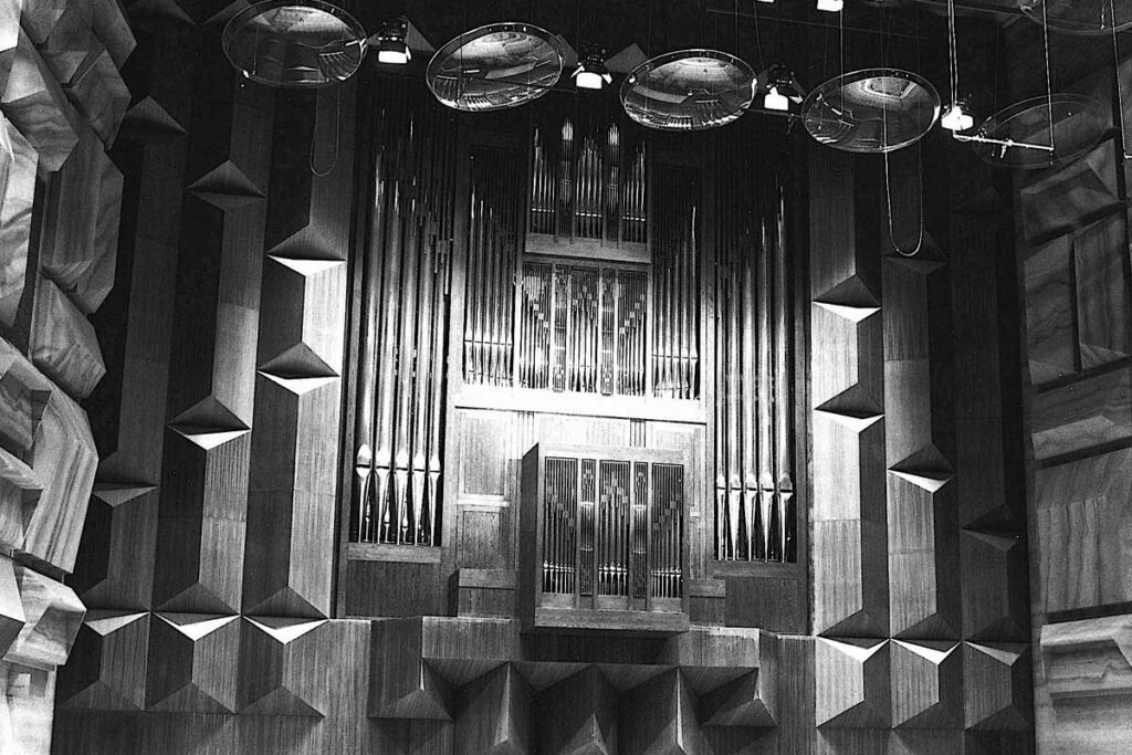 A photo of Hamer Hall's very large pipe organ in black and white.