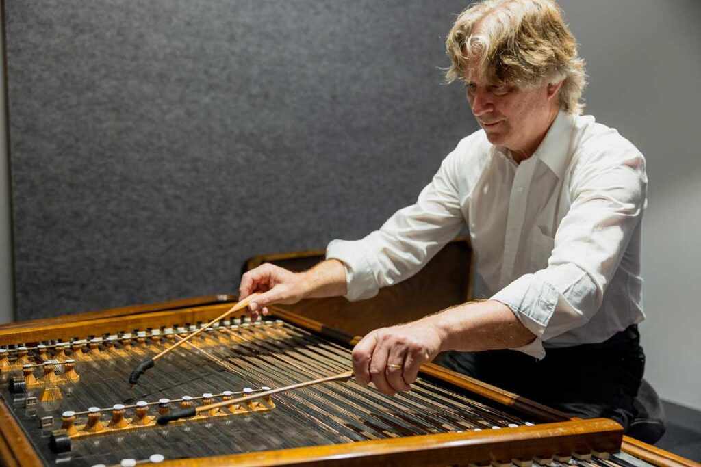 Peter Neville playing the cimbalom.