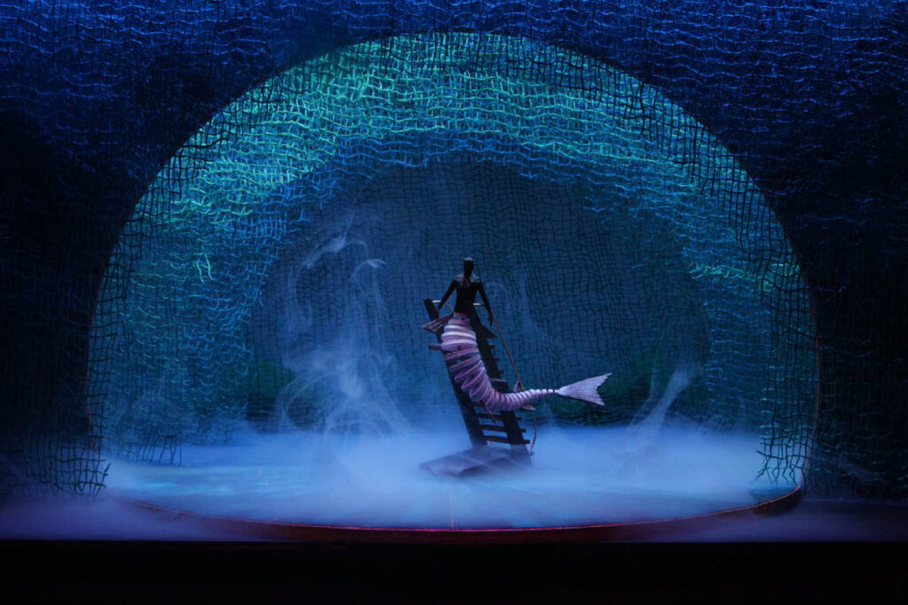 Set design for Peter and the Starcatcher, with a mermaid centre stage.