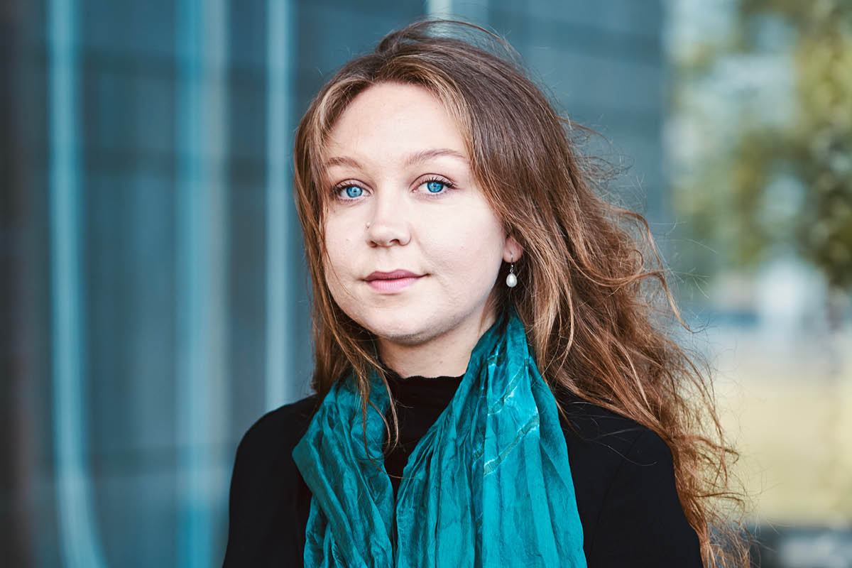 Kirsten Milenko in a blue scarf.