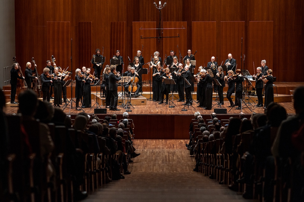 Freiburg Baroque Orchestra performing on stage.