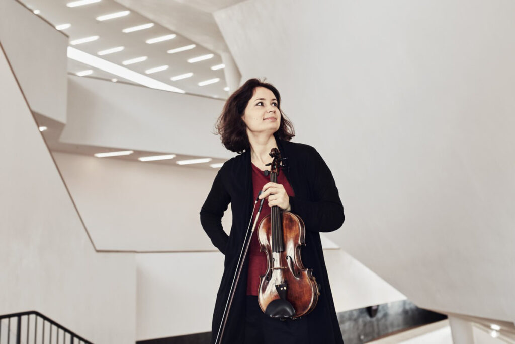 Patricia Kopatchinskaja poses with her violin.